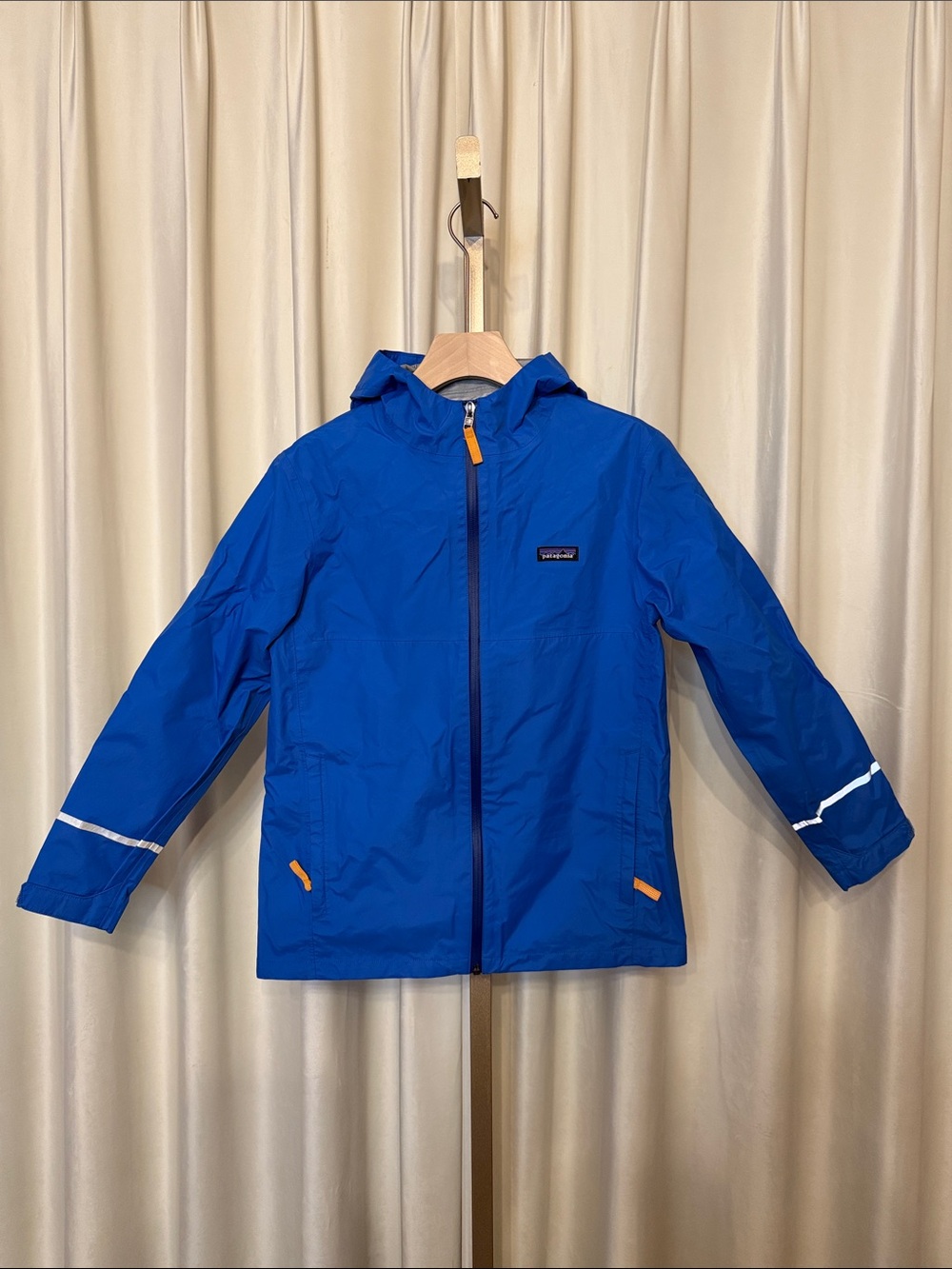 Patagonia Kids Blue Raincoat with Orange Accents